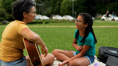 Mother-and-daughter-enjoying-day-at-the-park